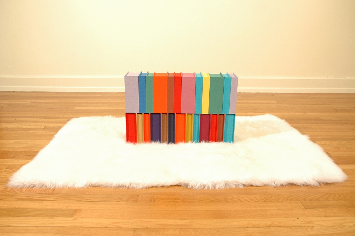  LbeOtrVayEal/AtrMahOosUinR; Bookdbinding Board, Fabric, Sheepskin Rug; 24" x 6" x 16"; 2005-06 