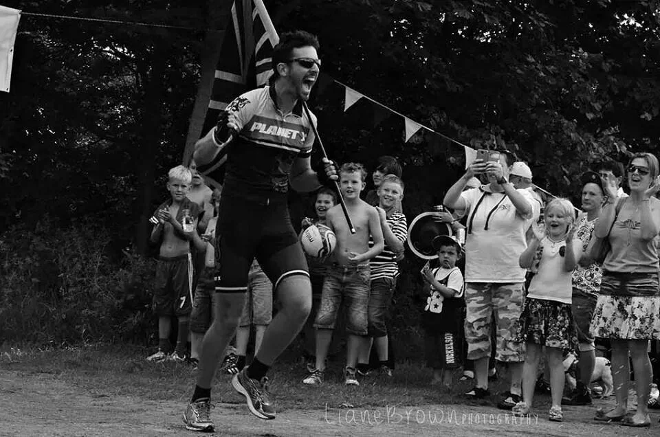 kris as he finishes 2514 miles, he looks kinda happy! 