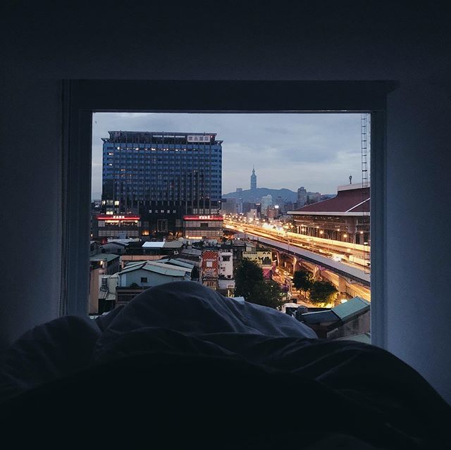 4.50AM/ a week ago in taipei; my attempt to catch the sunrise, no sun but still a good view from bed. #hostellife