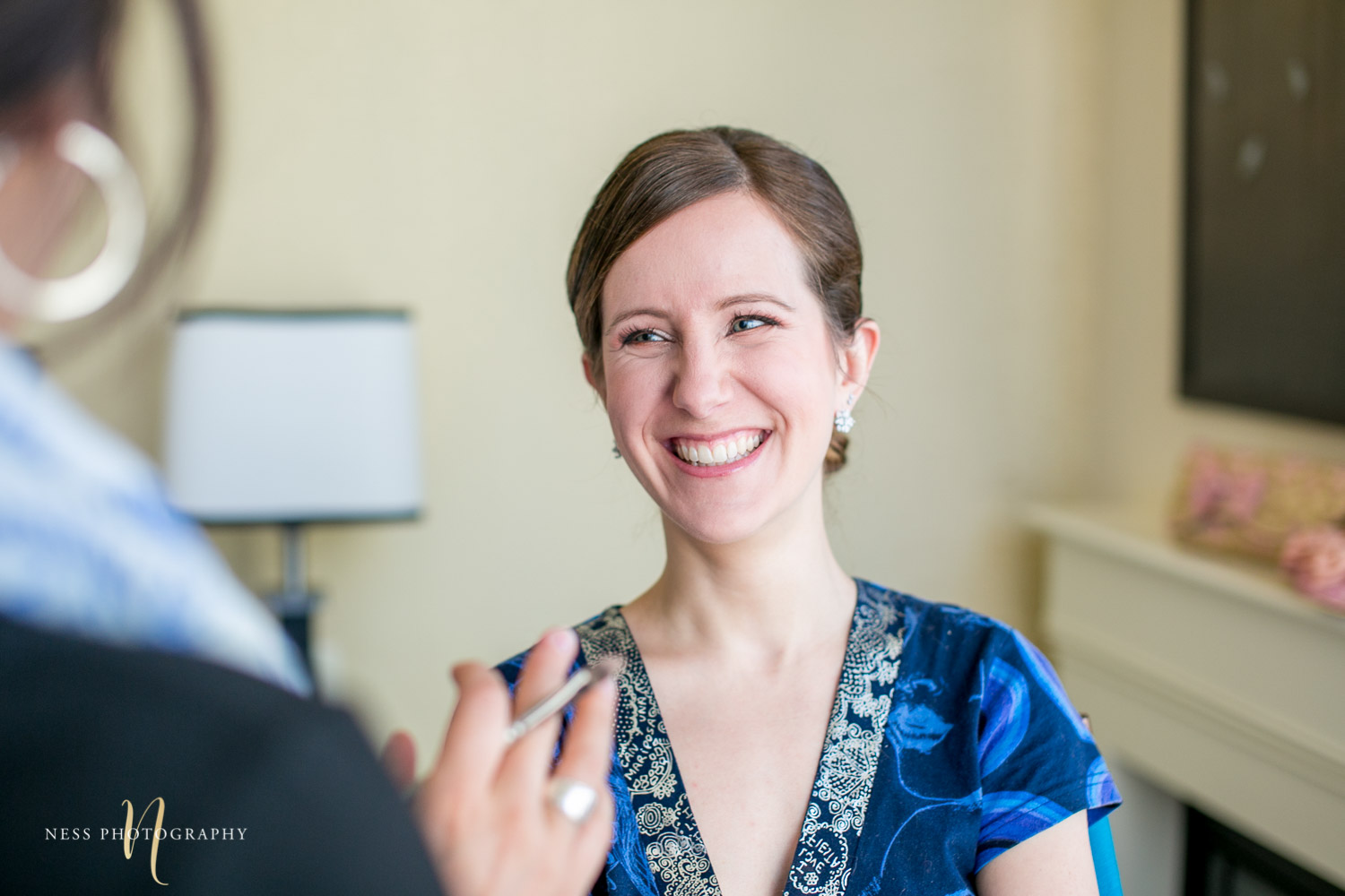 bride getting her makeup done for montreal elopement