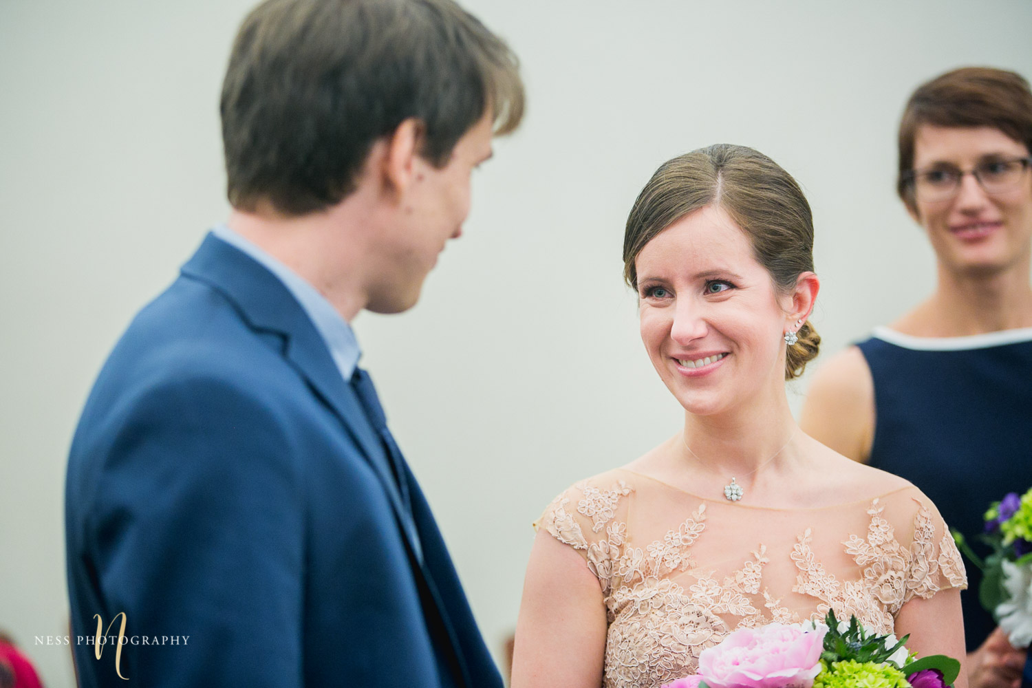 bride looking at groom during Montreal elopement at palais de justice
