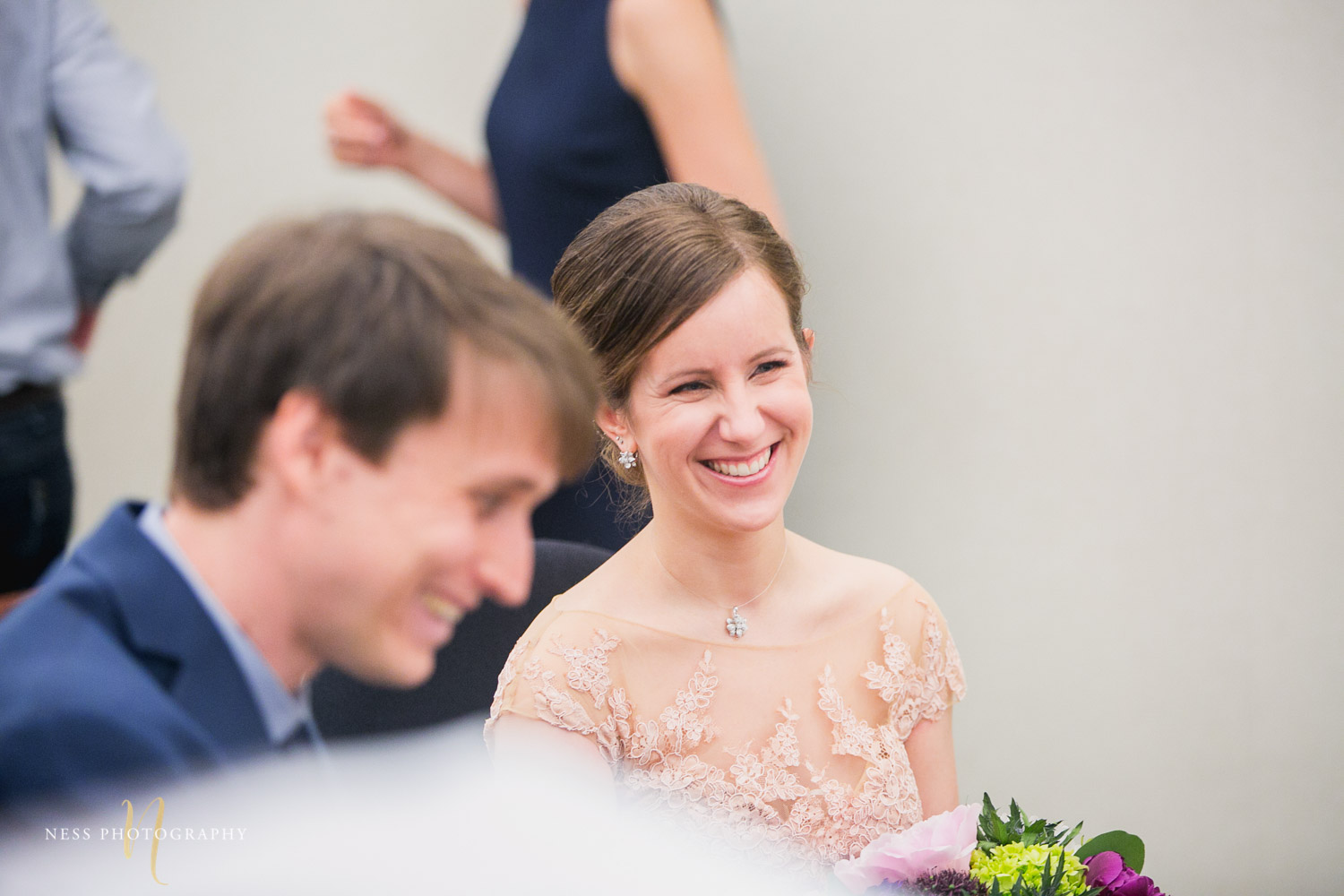 bride laughing during Montreal elopement at palais de justice