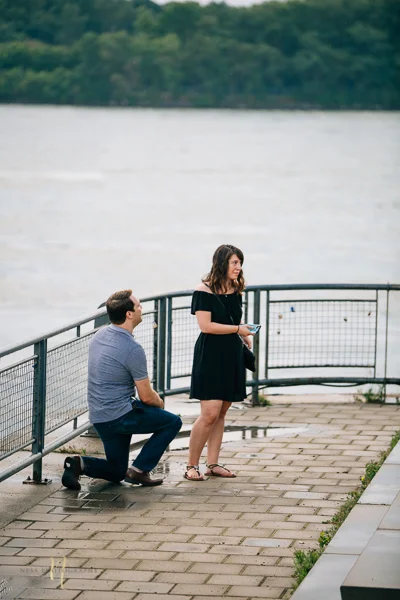 Surprise proposal in montreal old port clock tower by ness photography.jpg