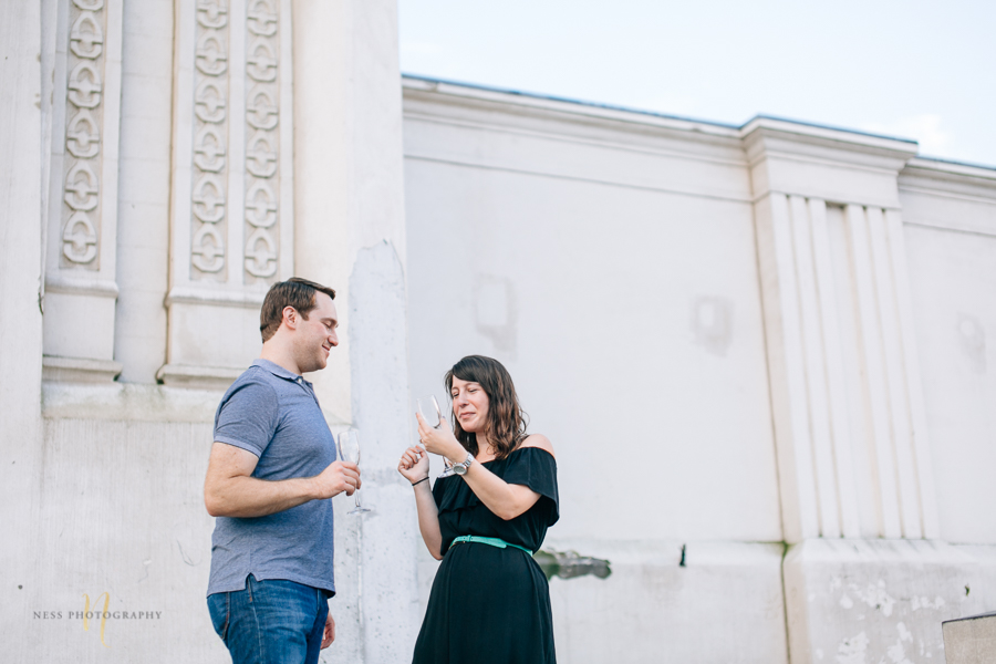 Surprise proposal  with champagne in montreal old port clock tower by ness photography montreal wedding photographer  6.jpg