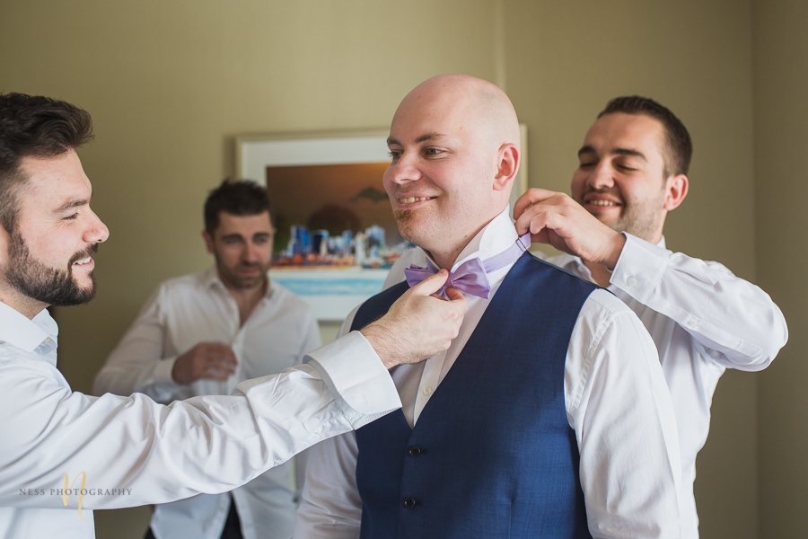 groom getting ready at Wedding at Forest and Stream club by Ness Photography