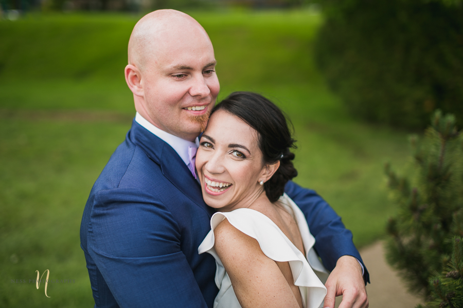 bride laughing at Wedding at Forest and Stream club by Ness Photography