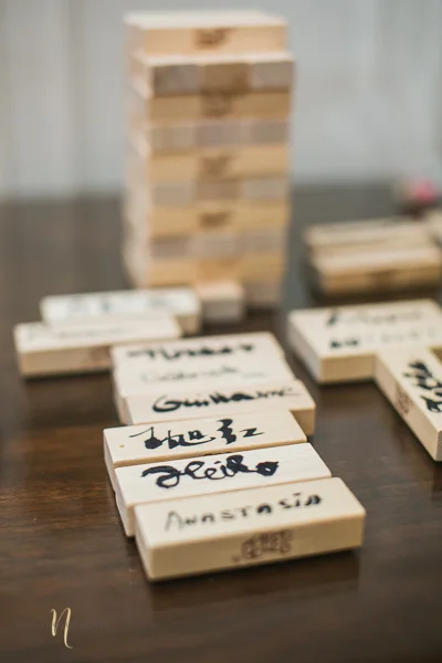 jenga game guest book at Wedding at Forest and Stream club wedding by Ness Photography