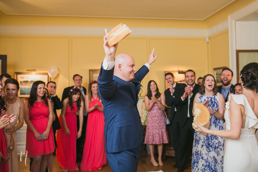 bulgarian bread breaking tradition at at Forest and Stream club wedding  by Ness Photography