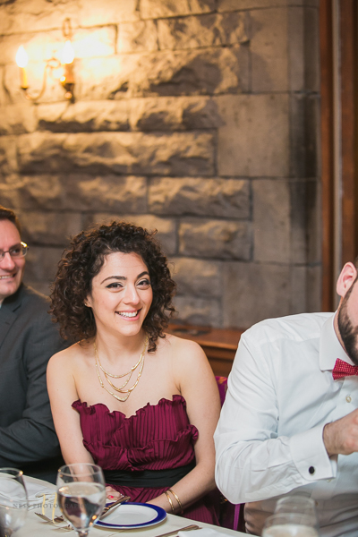 guests laughing at at Forest and Stream club wedding  by Ness Photography