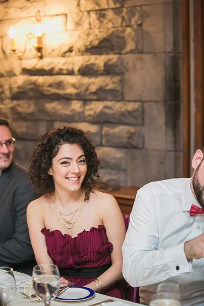 guests laughing at at Forest and Stream club wedding by Ness Photography