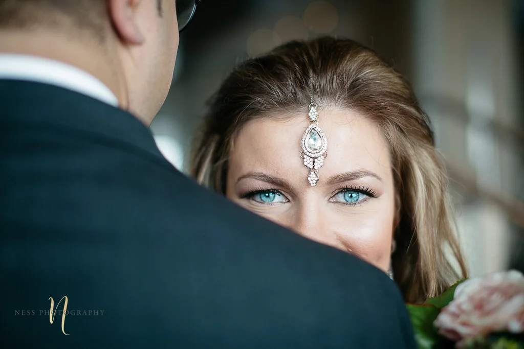Bridal photos for pakistani wedding in Montreal old port-- bride with bleu eyes and blond hair