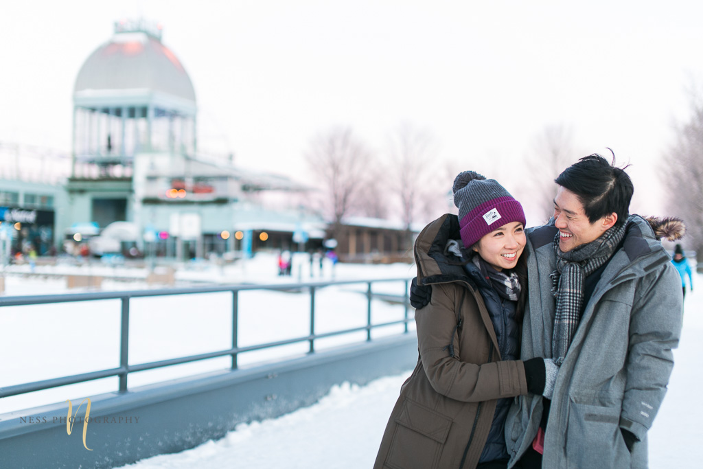 couple in front of bonsecours at winter sunset engagement photoshoot in montreal old port 