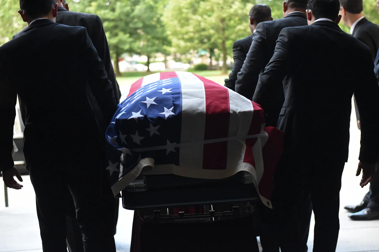  The remains of Tuskegee Airman and three-time Olympic medalist Malvin Preston Whitfield are carried outside of the National Cathedral on Wednesday, June 8, 2016 in Washington DC. (Photo by Christian K. Lee/The Washington Post) 