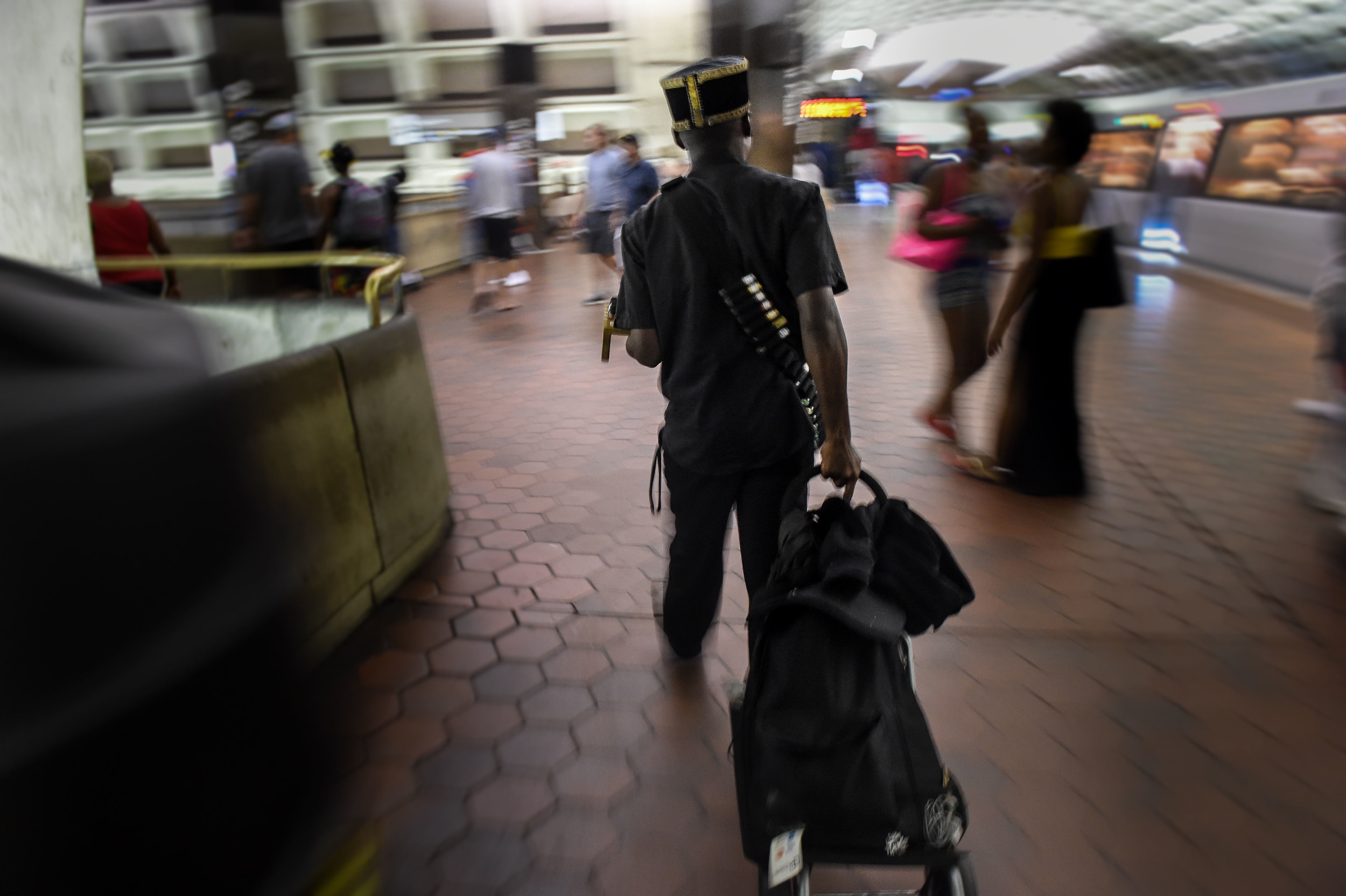  Millden rushes to the next train in search of customers Saturday, June 11, 2016. He mostly works 14hr work days to maintain his business and sell his products. 
