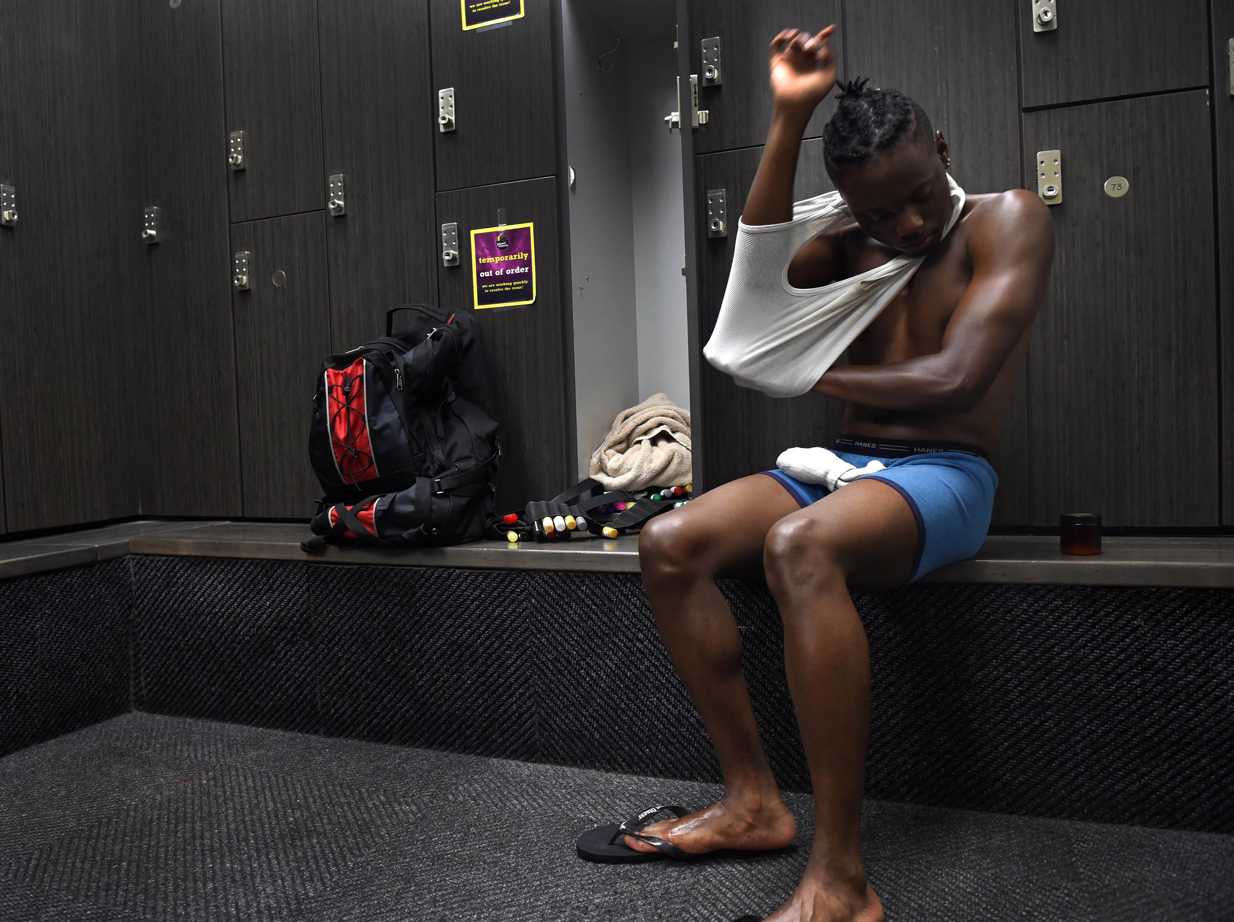  Millden gets dressed in a public gym. After moving out of his grandmother's house he now lives and sleeps in his car Tuesday, Aug. 2, 2016. He uses the gym as time to take showers and prepare for work.&nbsp; 
