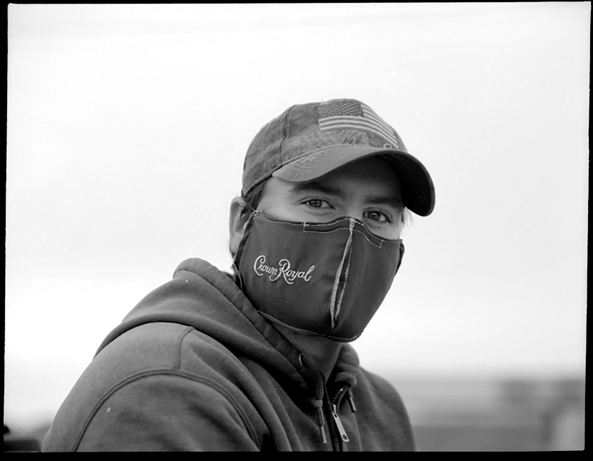  Mark Steenland, 35, wears a makeshift mask outside of HEB grocery store in Harker Heights, Tx on Friday, April 10, 2020. His mother and law made the mask from a Crown Royal liquor bag after several of his own attempts were uncomfortable. “I have a newborn at home and I don’t want to bring nothing home to him,” Steenland said.  