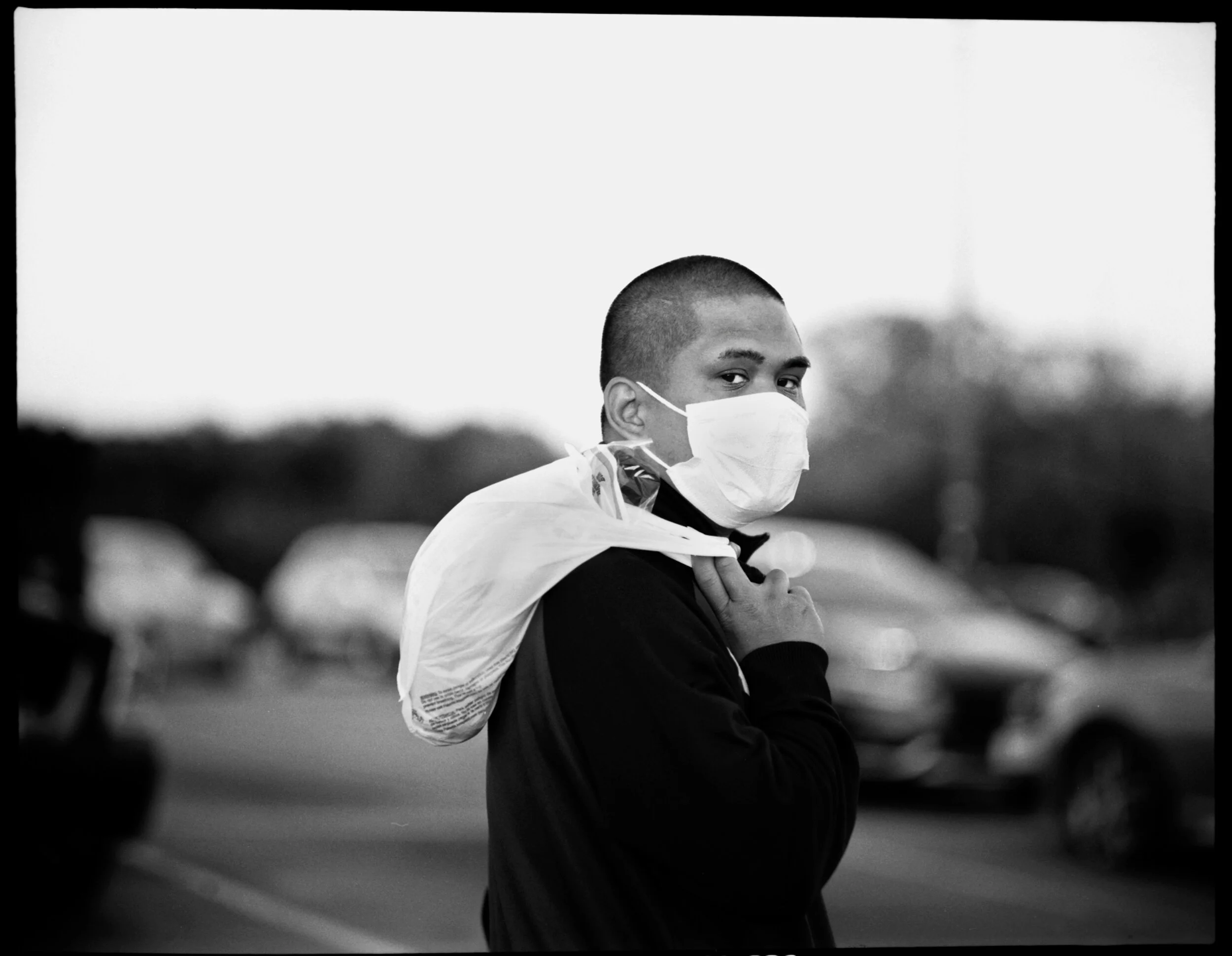  Glenn Macabitas, 37, is seen holding his customer’s groceries outside of HEB grocery store in Harker Heights, Tx on Monday, April 13, 2020. “Some of my customers have auto immune deficiencies and they are so happy when I arrive, it shows in the tips,” Macabitas said. Macabitas is a grocery delivery service worker. 