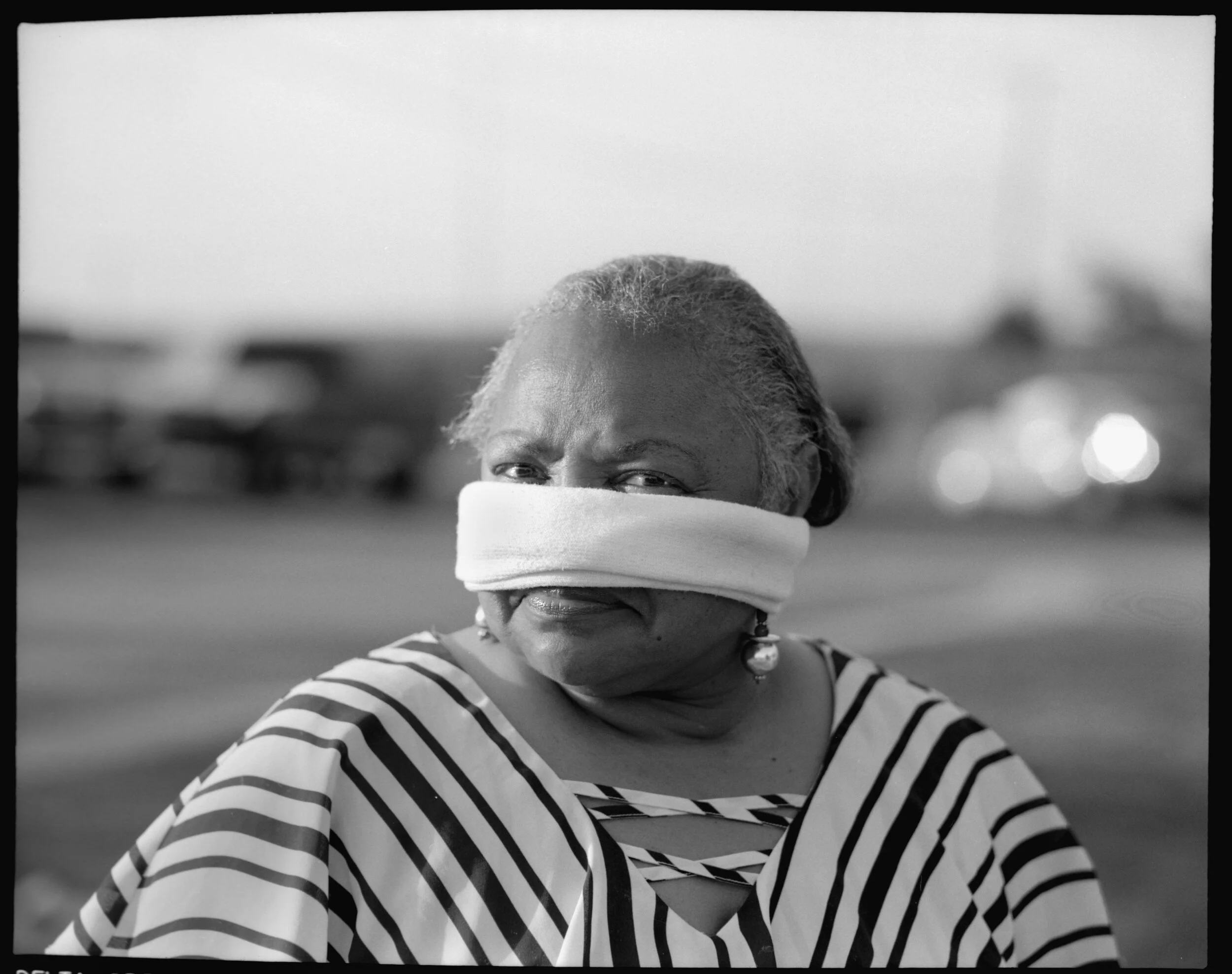  Donna Connerly, 64, wears a protective makeshift mask made from her son’s sock in Harker Heights, Tx on Monday, April 20, 2020. “I grew up making my own stuff,” Connerly said.  