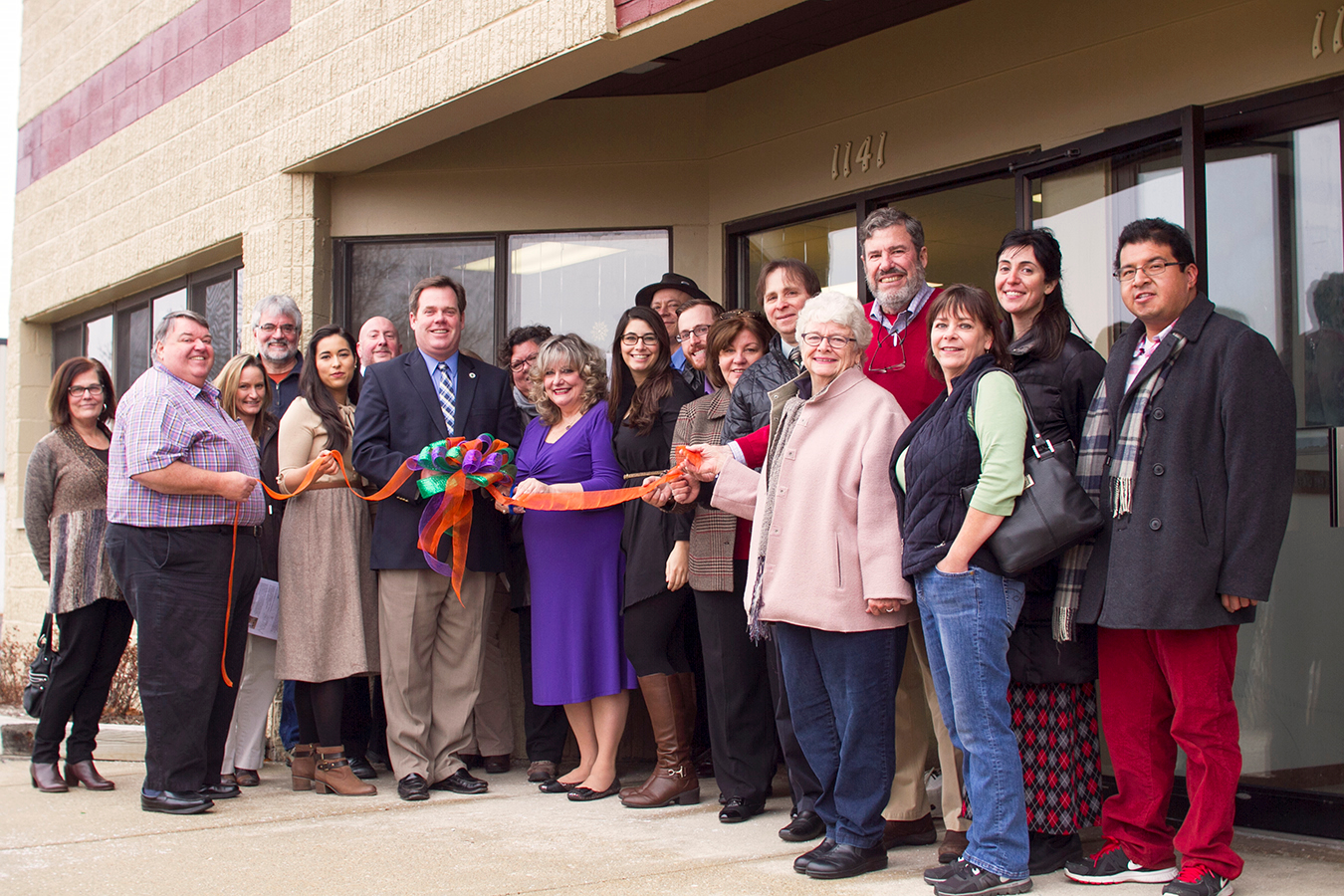 Ribbon cutting with Geneva Mayor Kevin Burns and so many do-over,me friends. December 1, 2014.