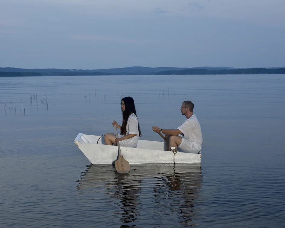A Seesaw and Two Paddlers