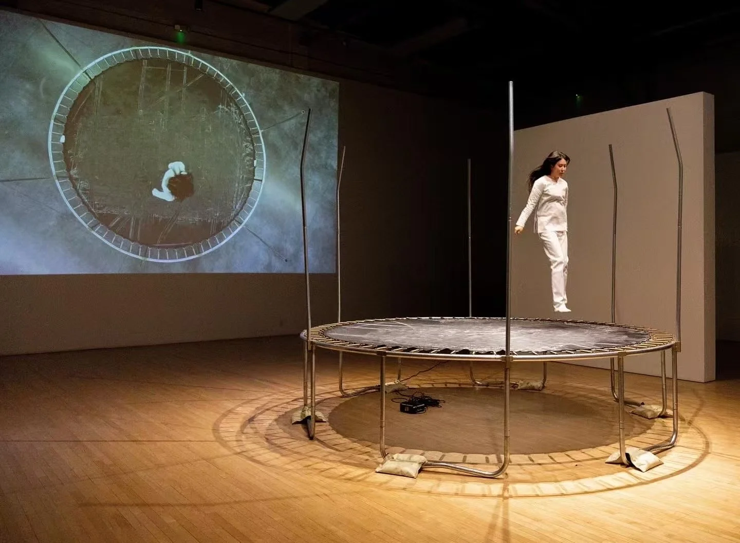  In  Trampoline House: Memory Drawing Series , Xie transforms a playground into a stage of temporal disintegration. Drawing from children’s games and the rawness of construction site materials, this durational performance collapses the boundaries bet