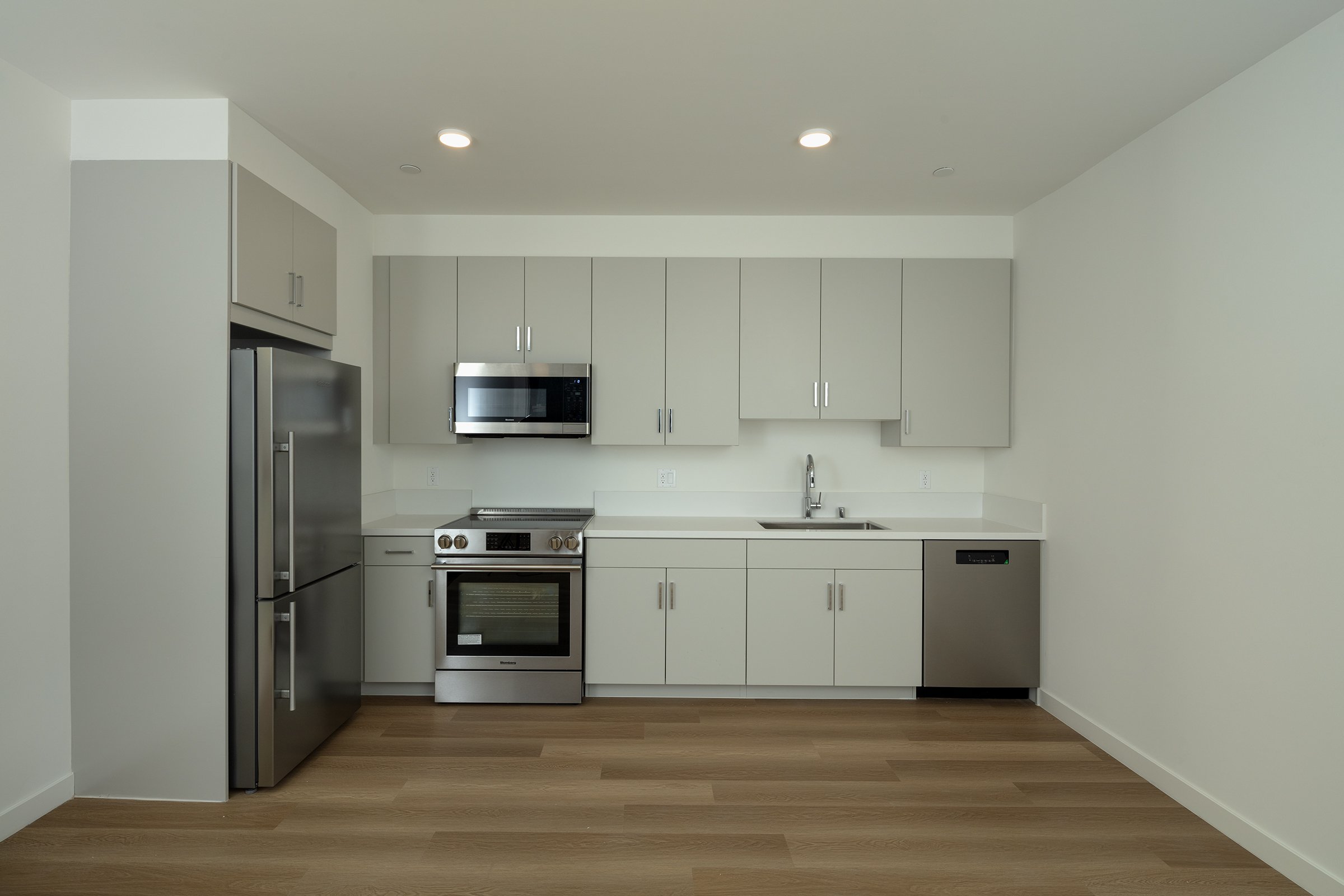 aero-collective-dunsmuir-row-multifamily-kitchen-cabinets.jpg