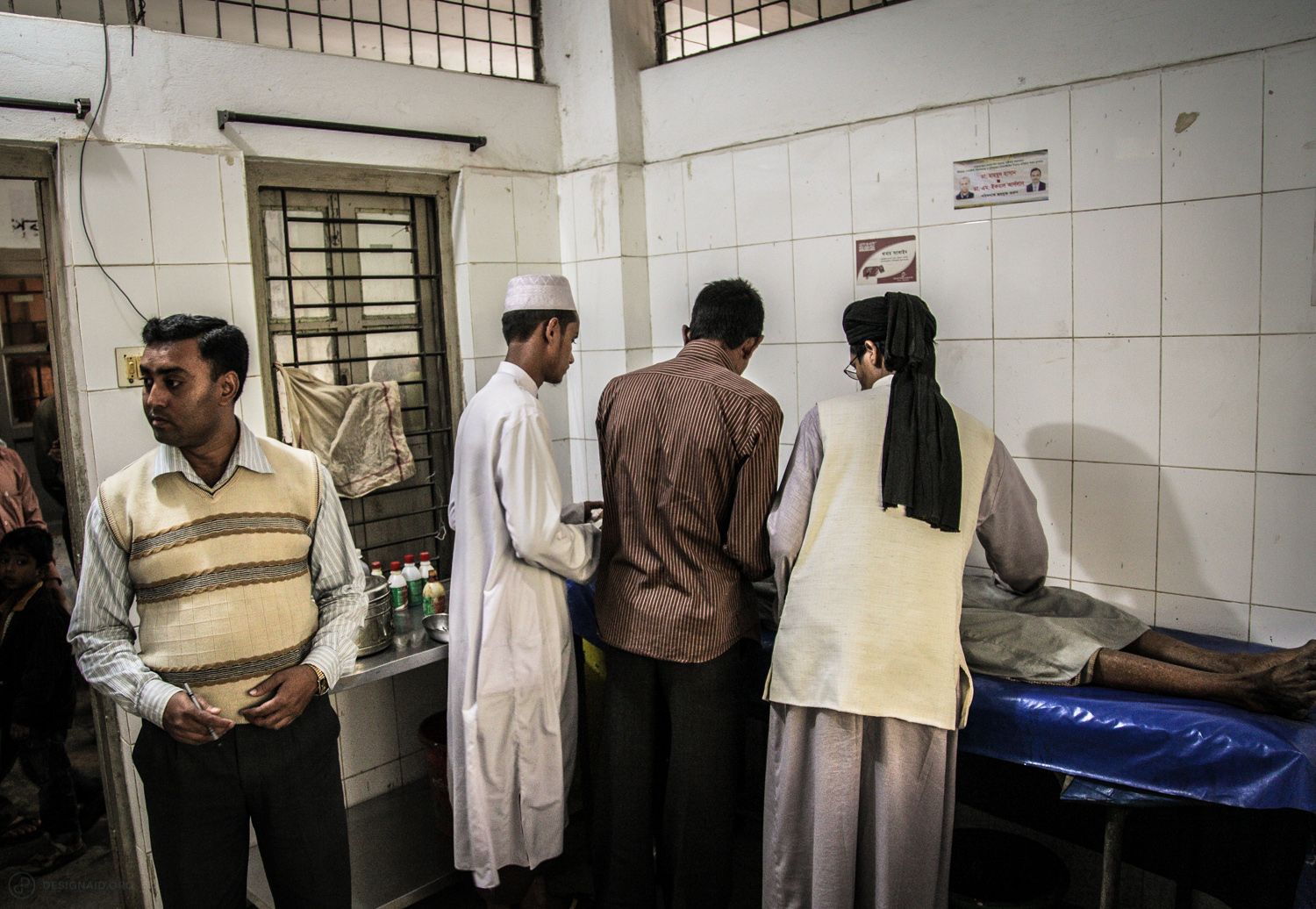  A patient is taken care of in the hospital examination room 