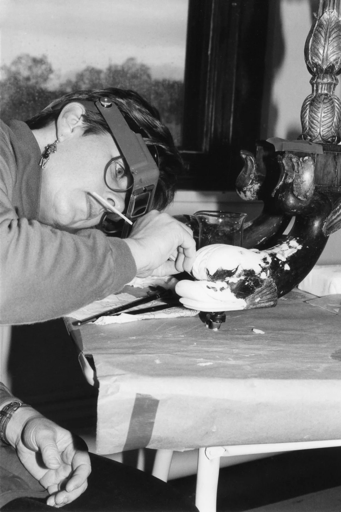 Restoring dolphin foot on Charles-Honnore Lannuier cardtable 