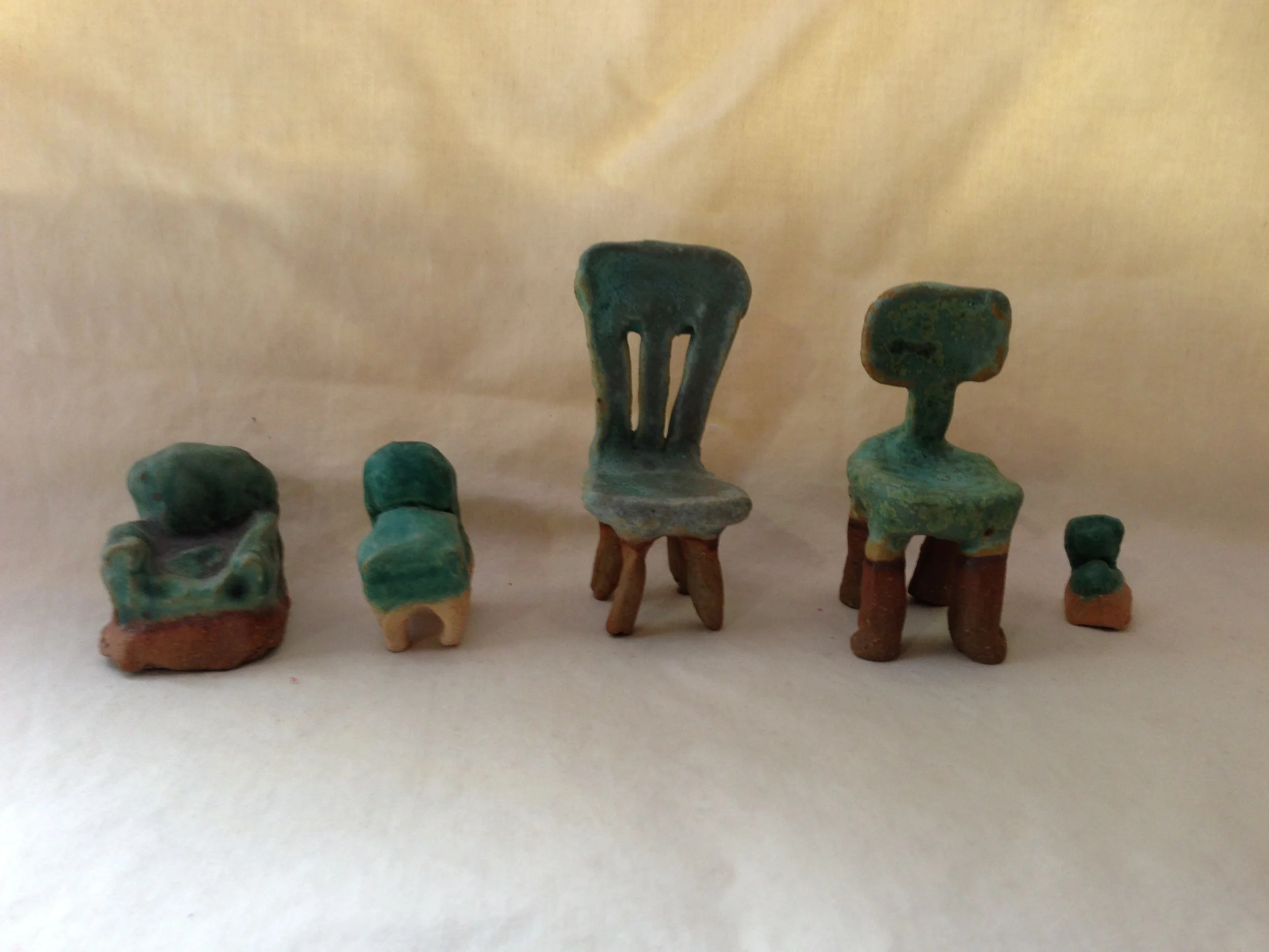 Untitled (Chairs).  Ongoing - Sampling of ceramic chair series.  Exhibited in Sumei Food For Thought Exhibition and Adelphi Artists and Authors Exhibition.