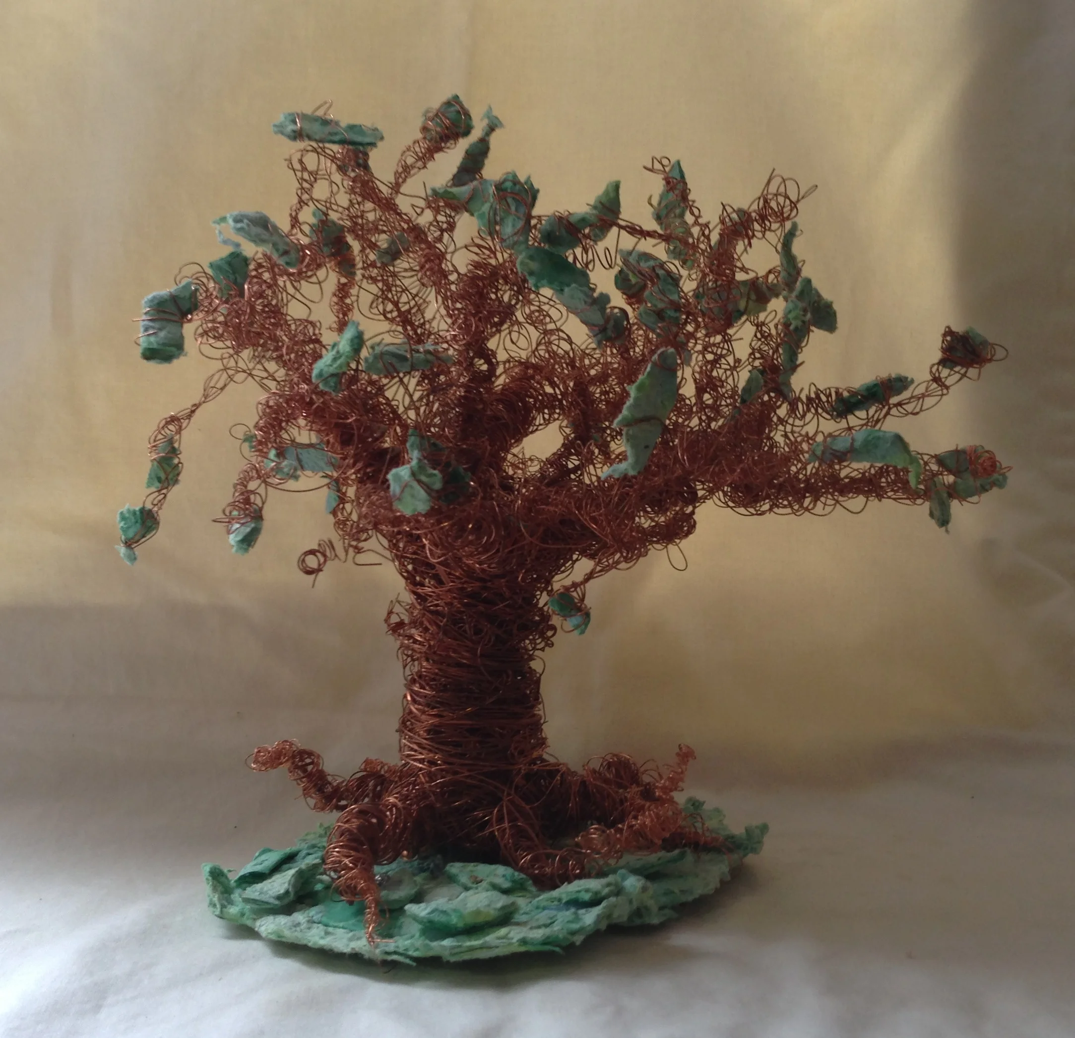 Tree Sculpture 2011.  Wire and Hand-made paper.  Exhibited in Artists and Authors Exhibition at Adelphi University.