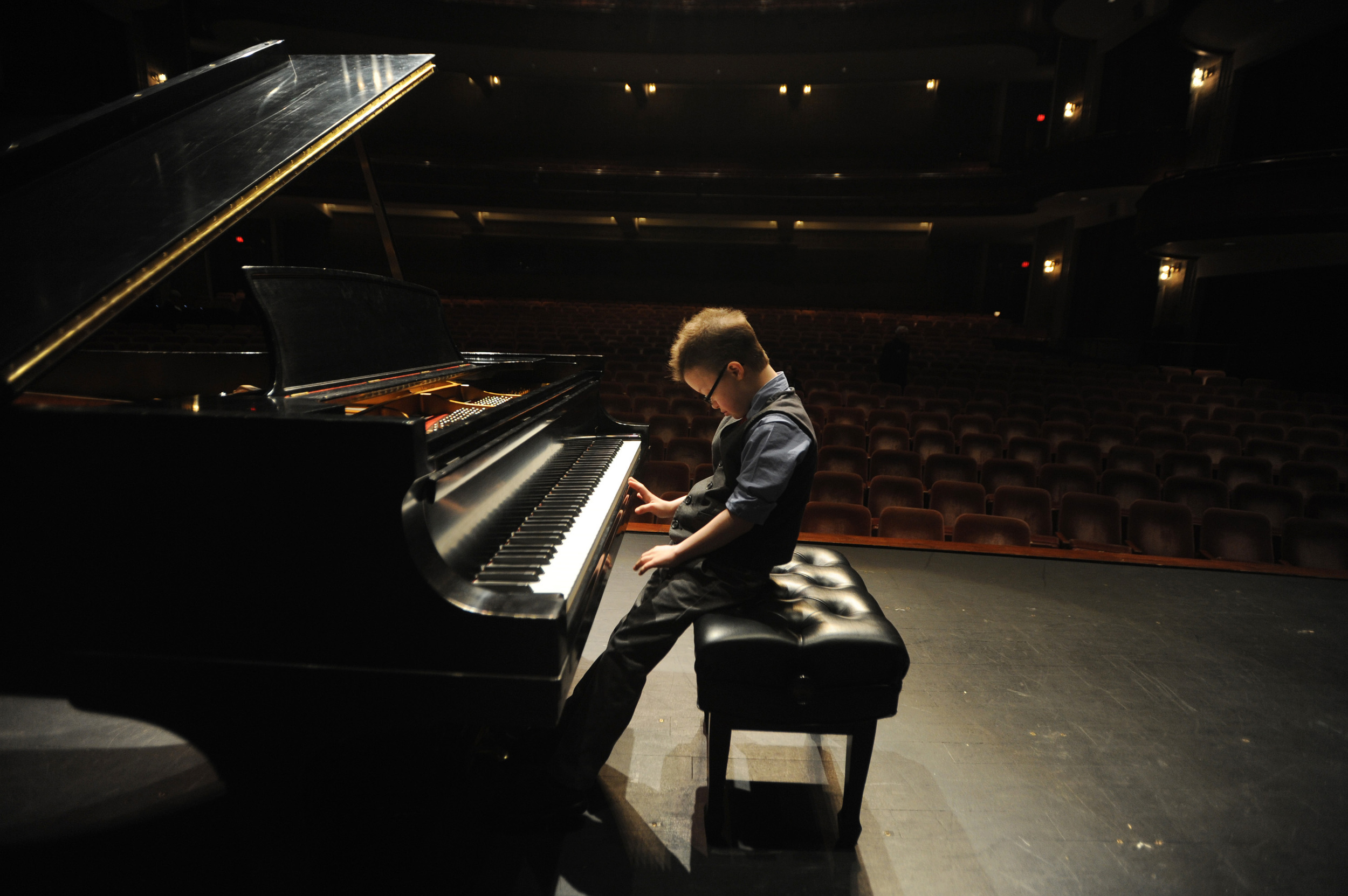  Peter Rosset, 11, who has been diagnosed with acute lymphoblasic leukemia, gives a private piano performance for Greenville Symphony Orchestra Conductor Edvard Tchivzhel at the Peace Center.  Rosset's Make-A-Wish Foundation wish is to receive a baby