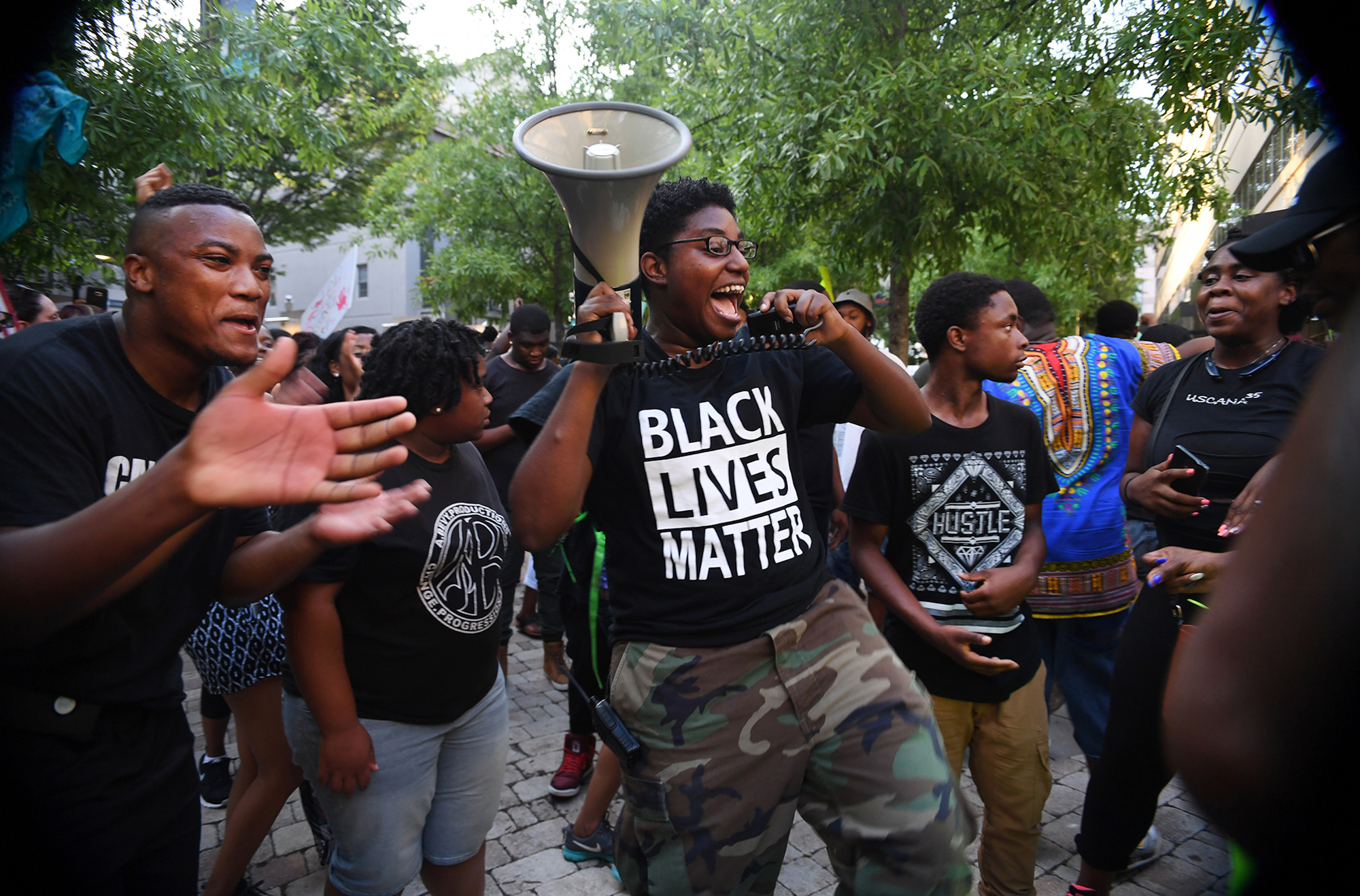  During the second night of a Black Lives Matter peace rally, a group of protestors cheer in NOMA Square in downtown Greenville before being asked to leave. 