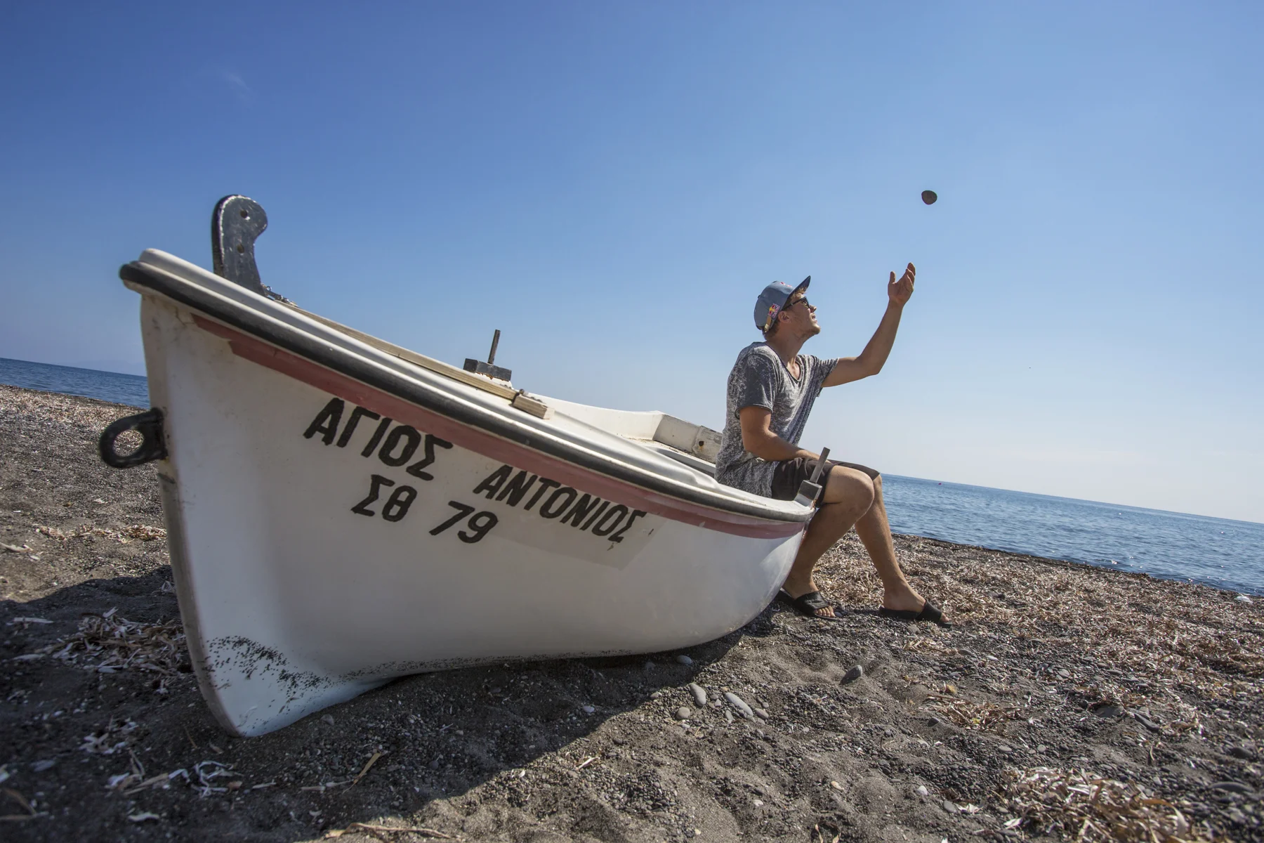 Jason Paul, playing on the black beach in Perissa Beach. 