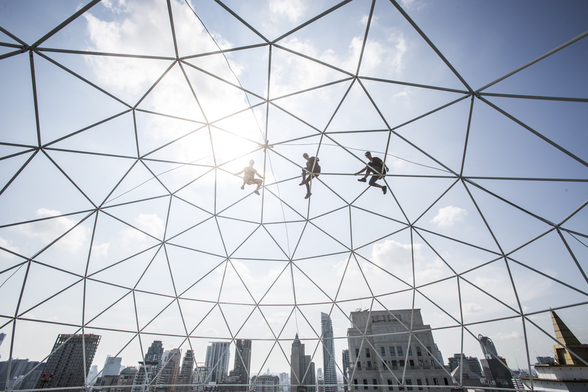Luciano Balestra, Jason Paul and Anan Anwar on top of a spider web. 