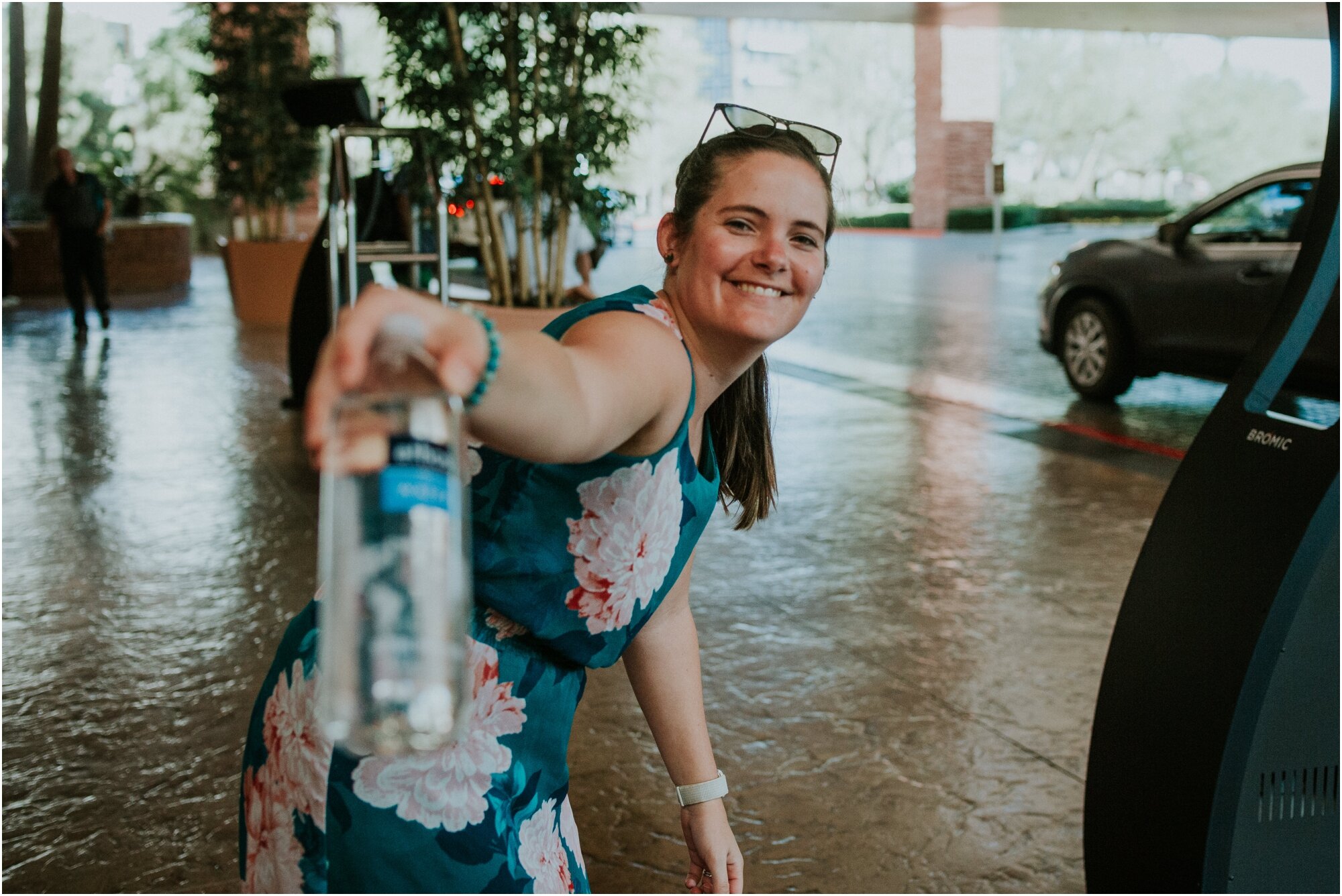   Trying to keep the groom hydrated, apparently, before we head out to the first look!   Photo: Jeff Patterson  
