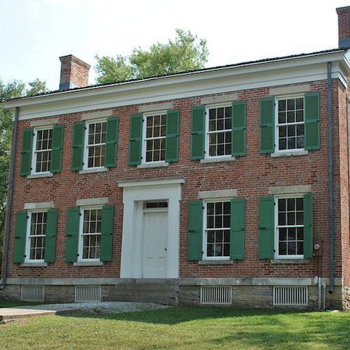 KitchenVisions Antique home with traditional double hung windows.png