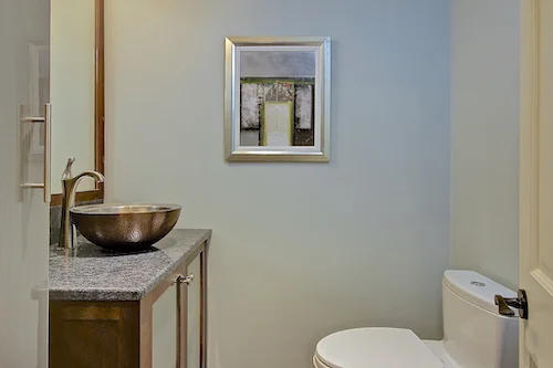 KitchenVisions | Westwood Powder Room with Hammered Copper vessel sink.jpeg