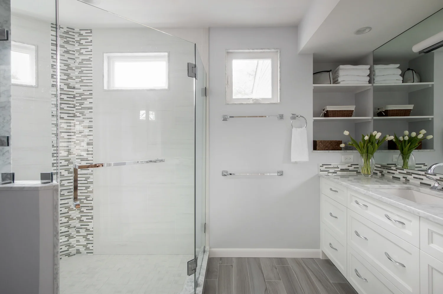 Master bath vanity and shower after reconfiguration - shower wall shared with family bath