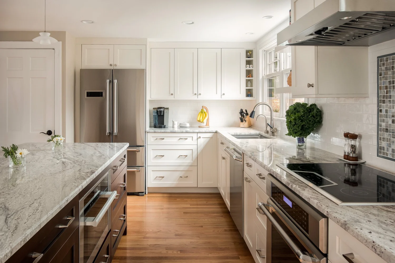 River White granite counters with a quarter bevel edge. Photo by: Michael Lefebvre