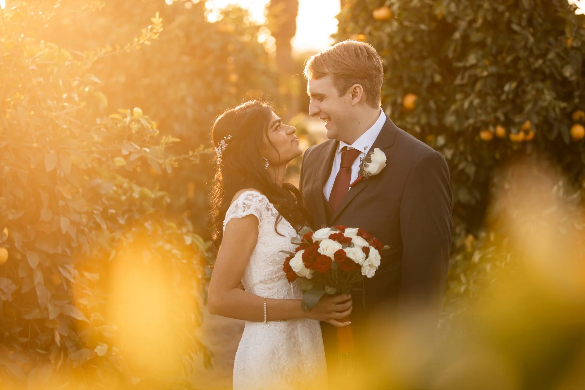 wedding-couple-orange-grove-golden-hour-california-citrus-park-riverside-ca.jpg