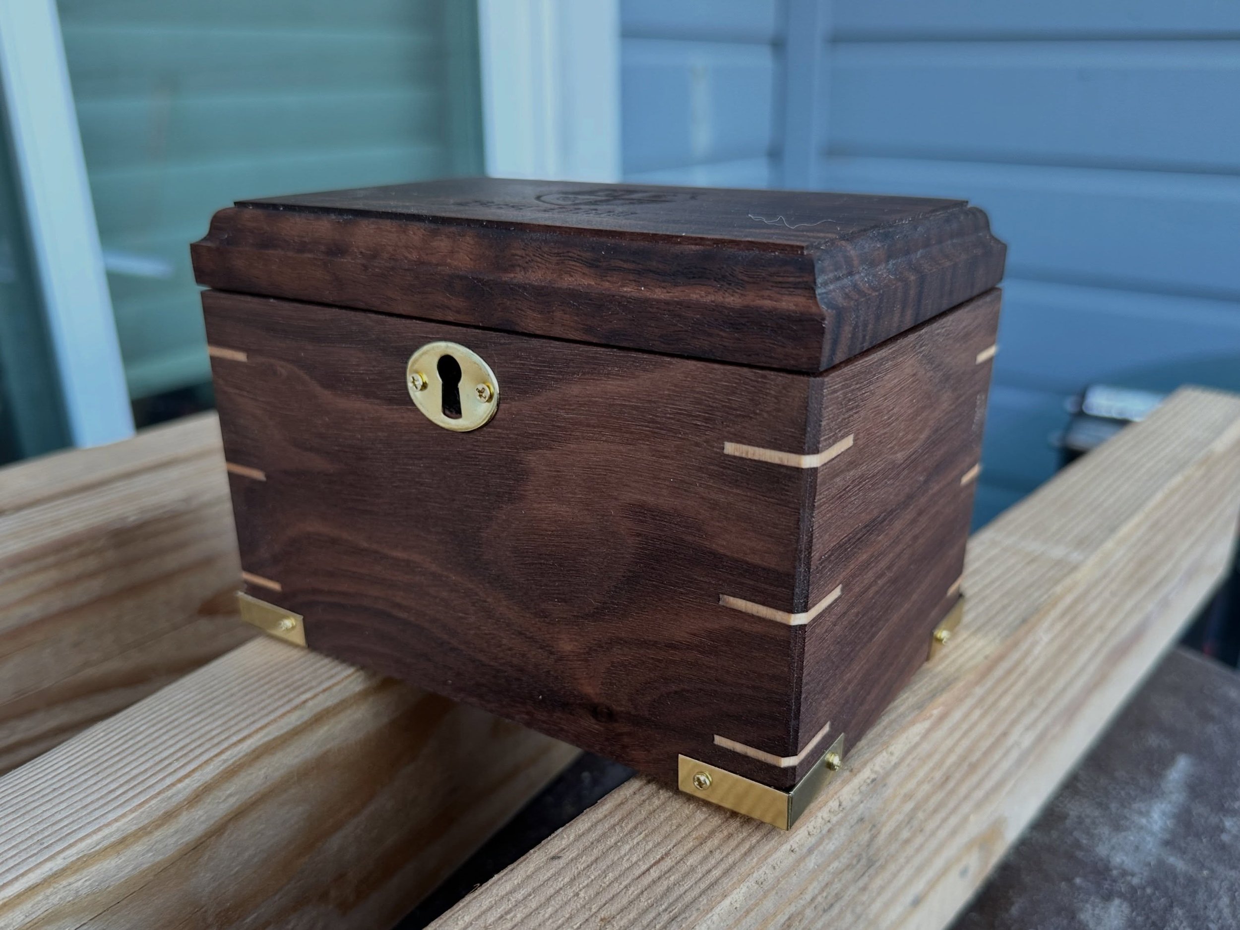 Walnut keepsake box with maple inlays and hand-mortised hardware, made for my brother-and-best-man in my wedding next month
&mdash;
#woodworking