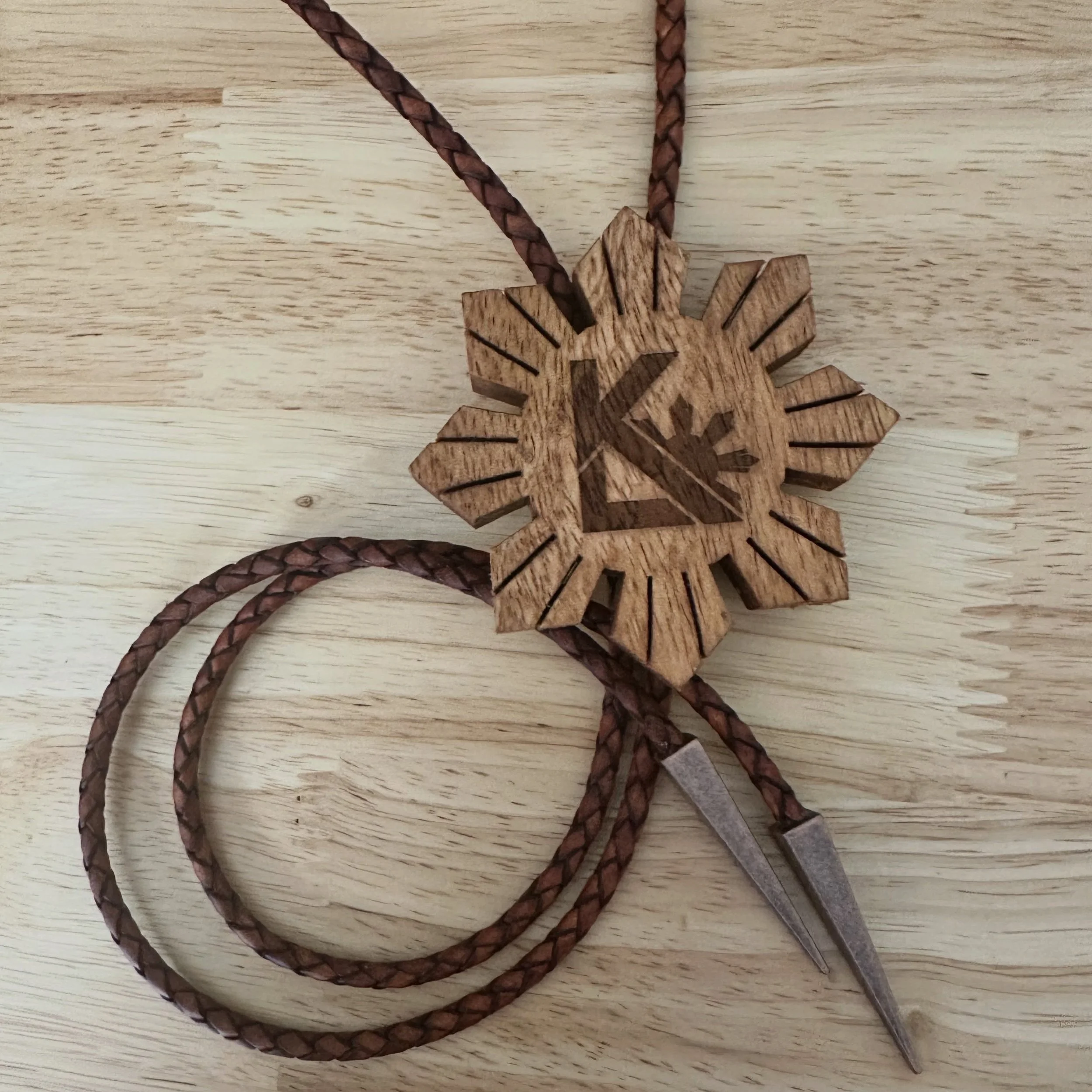 Two bolo ties in mango and mahogany wood commissioned for a client gifting them to Filipino pro boxer, Kyle Lacanlale 💪🏽🥊 did I mention that we offer engraving services? DM me about a project you&rsquo;d like to bring to life!