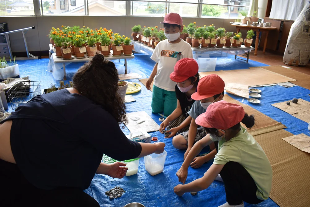 Red hats testing glue.jpeg