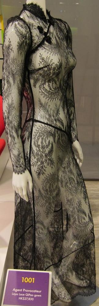 Here is a similar lace dress from Agent Provocateur, similar in design with a different neckline, and the details are a little more clear.