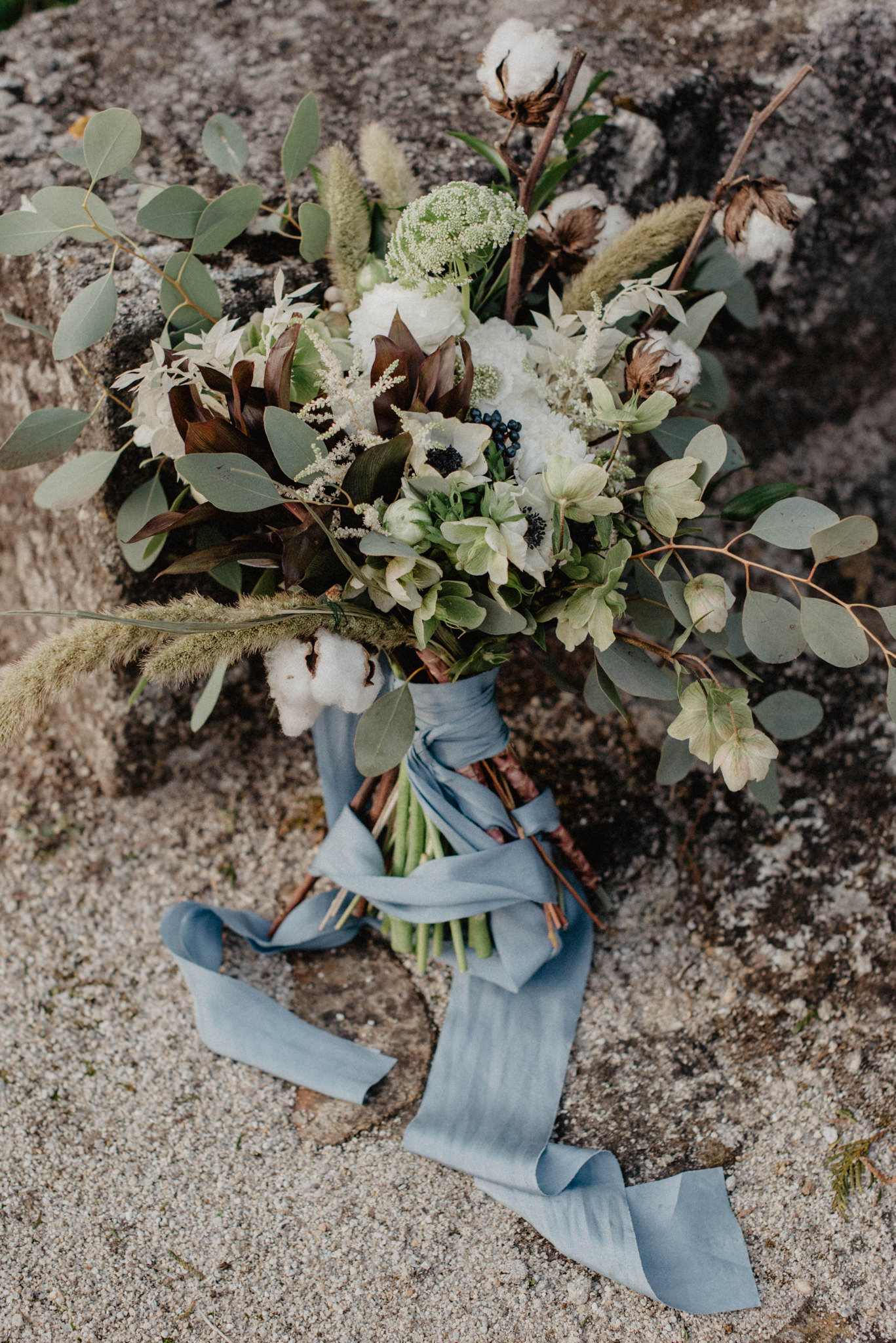 wedding-bouquet-with-blue-ribbon-and-cotton-flowers.jpg