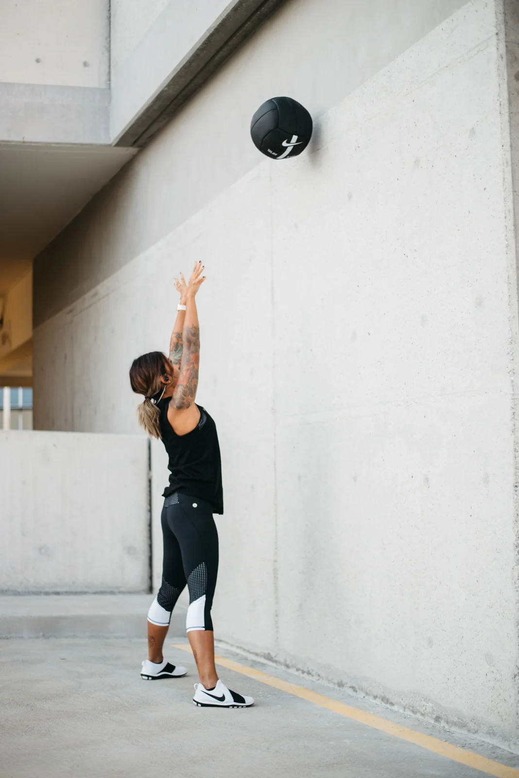 Power through the legs and toss the ball engaging the lats as you toss.
