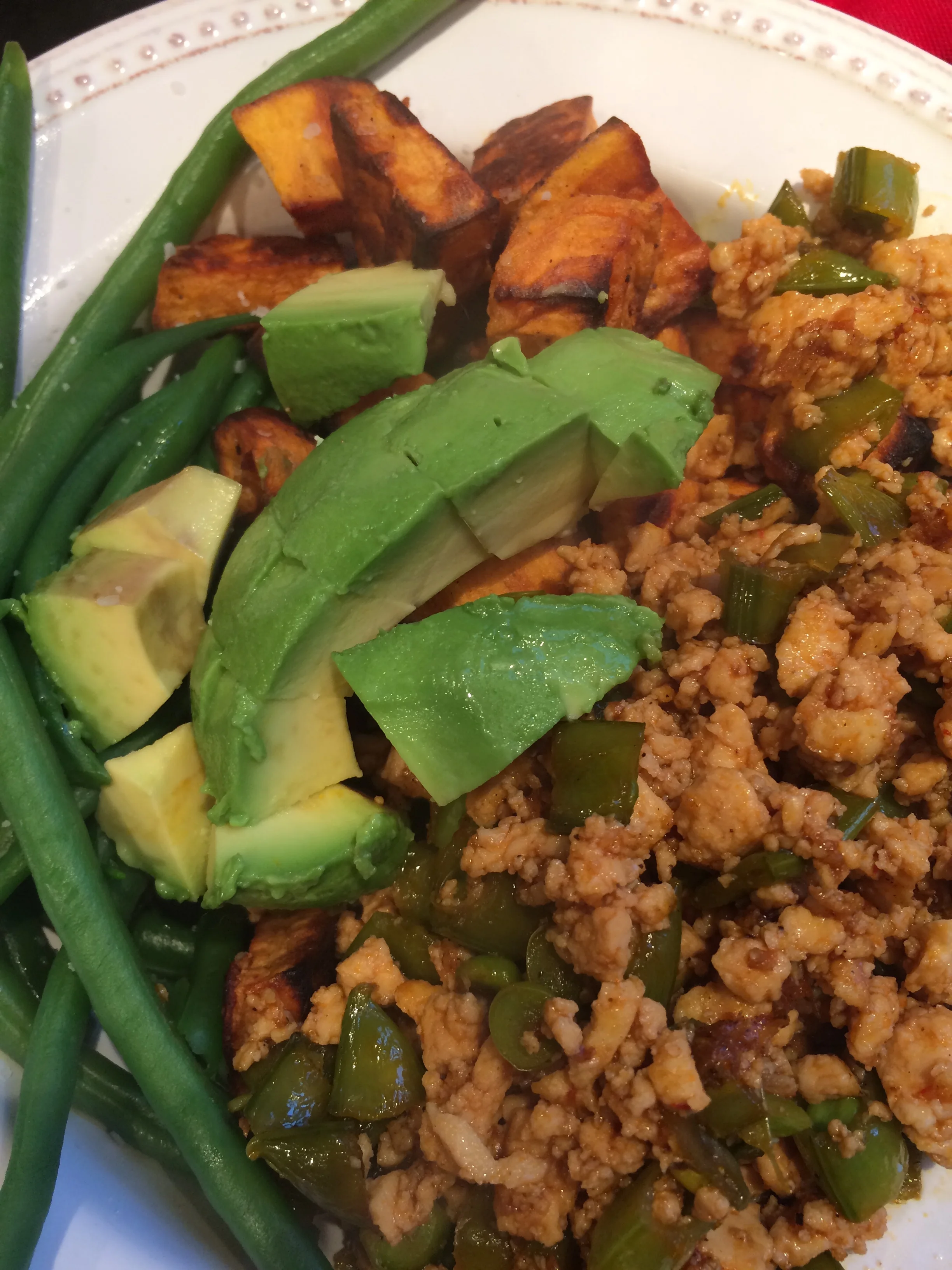 Spicy tofu with snap peas, with roasted sweet potatoes, avocado, green beans