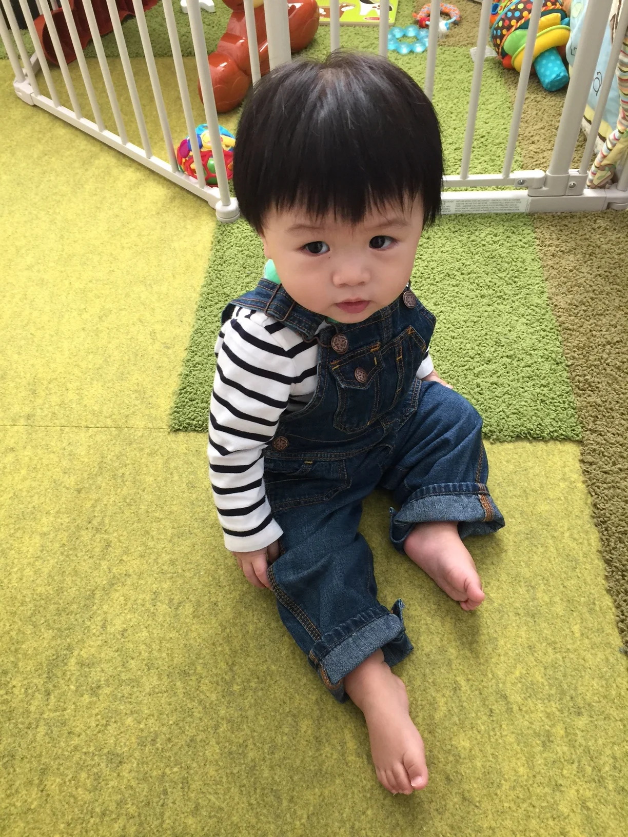Phil wearing Gap long-sleeved onesie and OshKosh B'gosh overalls