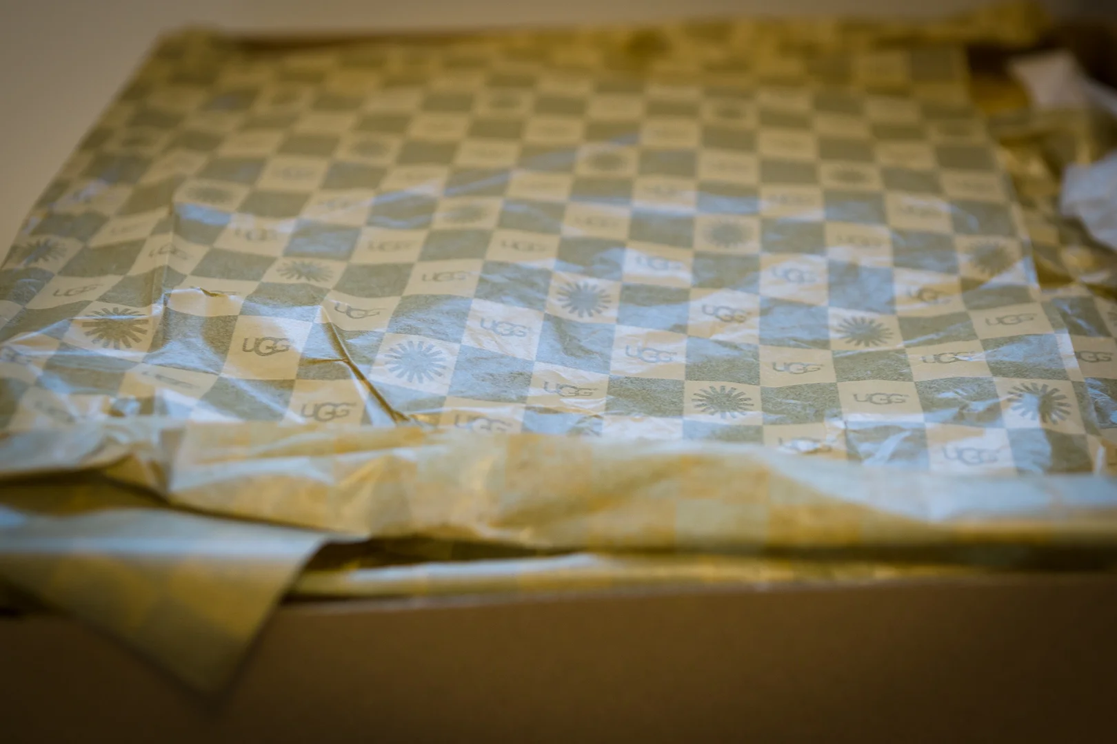 Loving this checkered tissue paper with UGG branding.