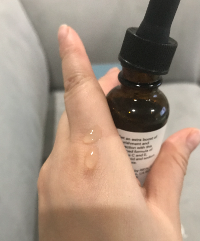 The serum is clear, almost scentless, and smooth and non-sticky. It absorbs well into your skin.